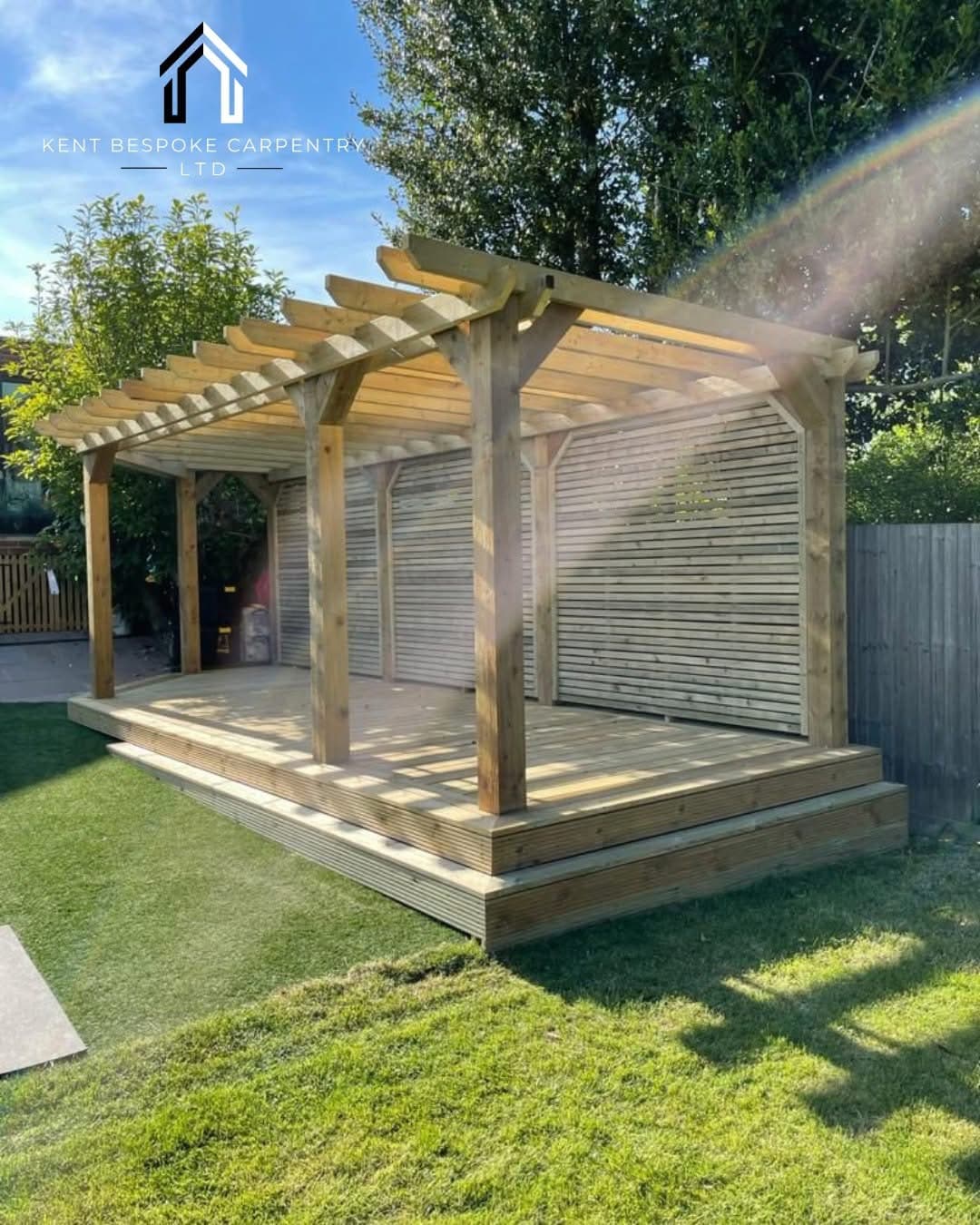 Pergola with slatted screens over raised decking
